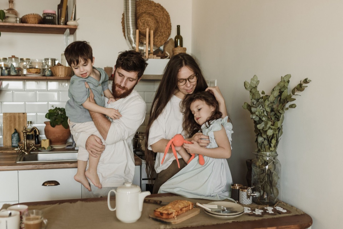 Family of four at home